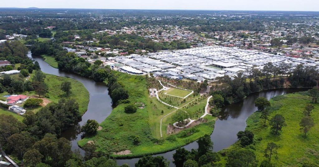 Aerial shot of over 50s lifestyle resort by the river