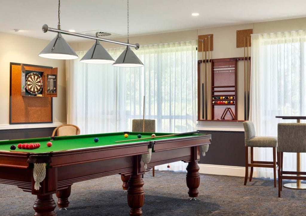 Games room with billiards and darts for over 50s lifestyle resort in Caboolture by Living Gems