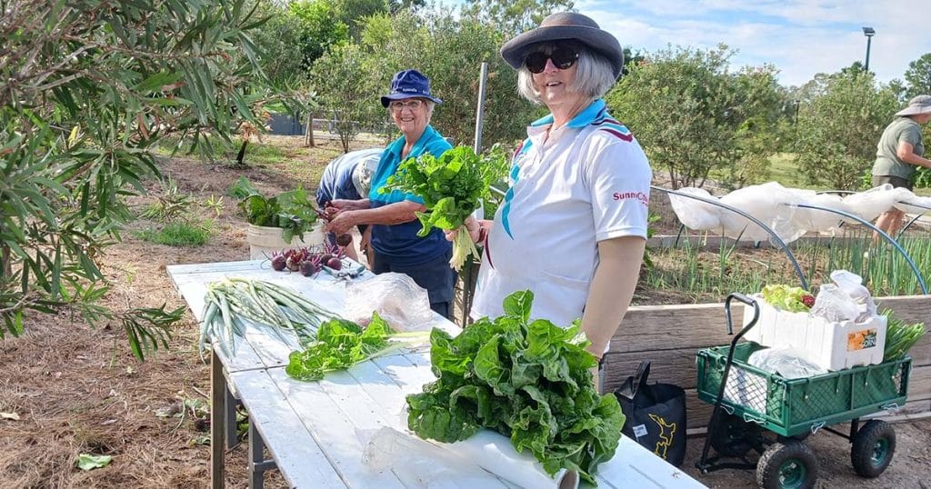 Residents tending to community garden