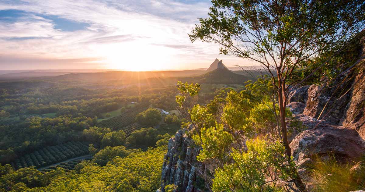 View of the Glass House Mountains at sunset