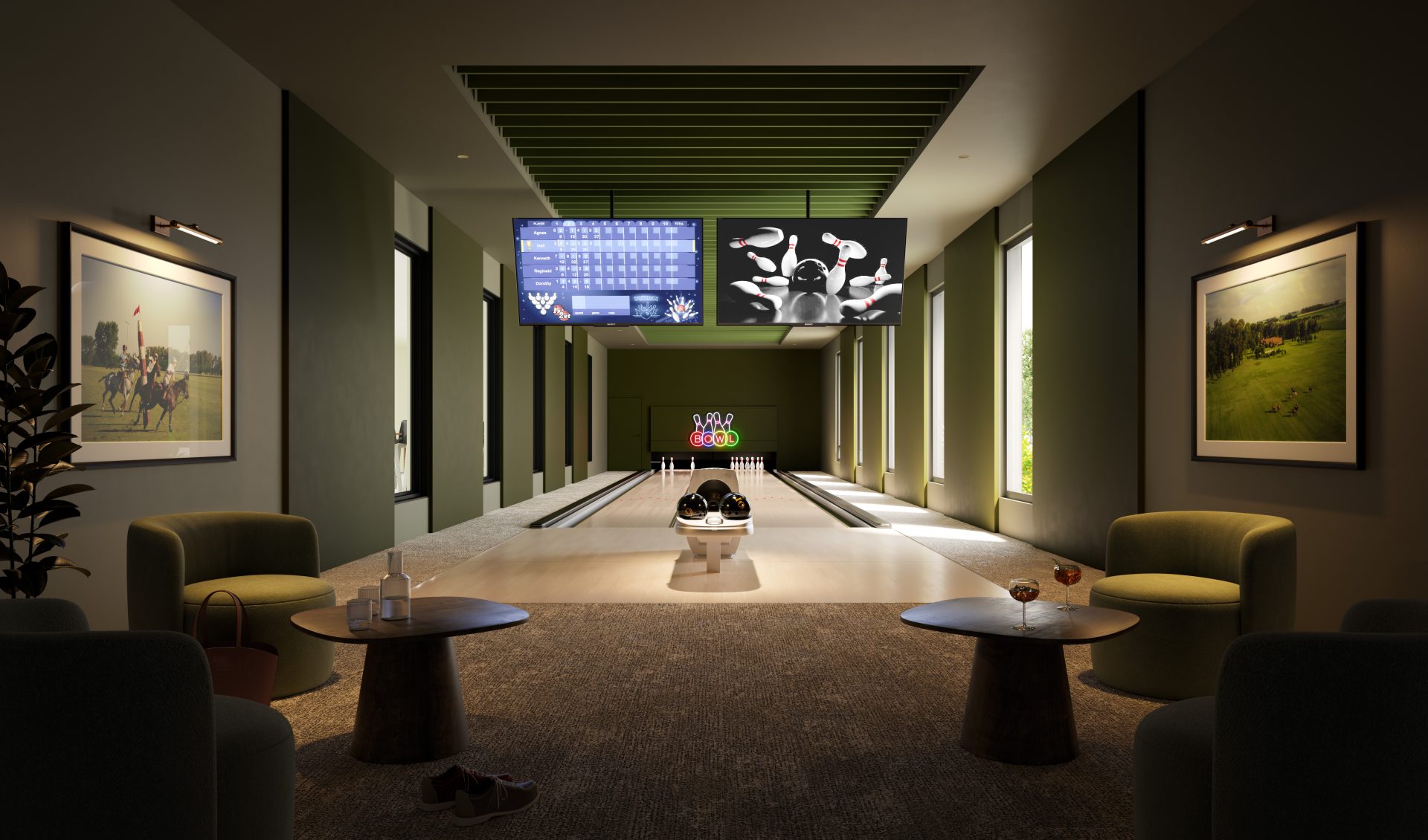 Sophisticated resort-style cinema lounge featuring dark walls, plush armchairs, small round tables, soft ambient lighting and a large screen at the front of the room.